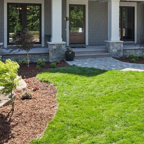Modern house front yard landscaping with stone path